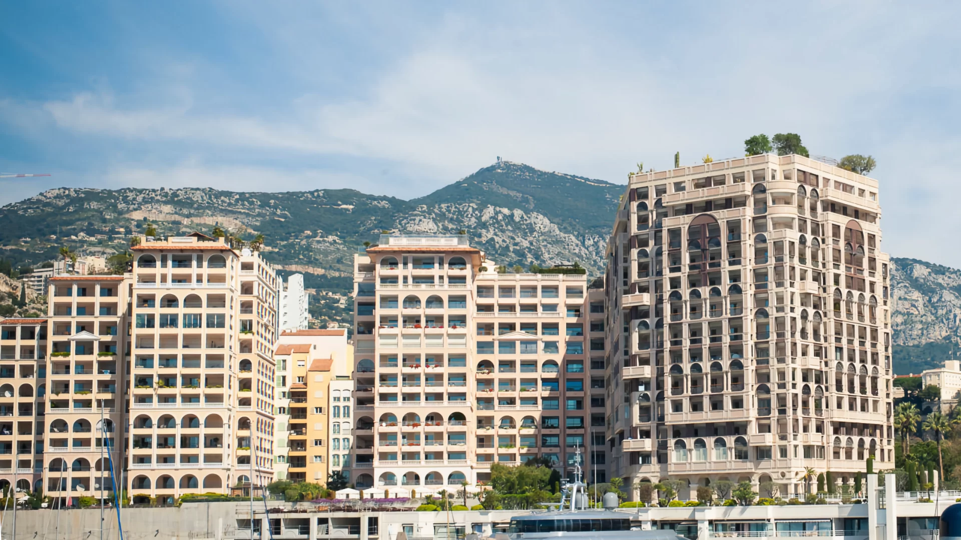 Le Memmo Center Monaco - Modern luxury apartments with Mediterranean views.