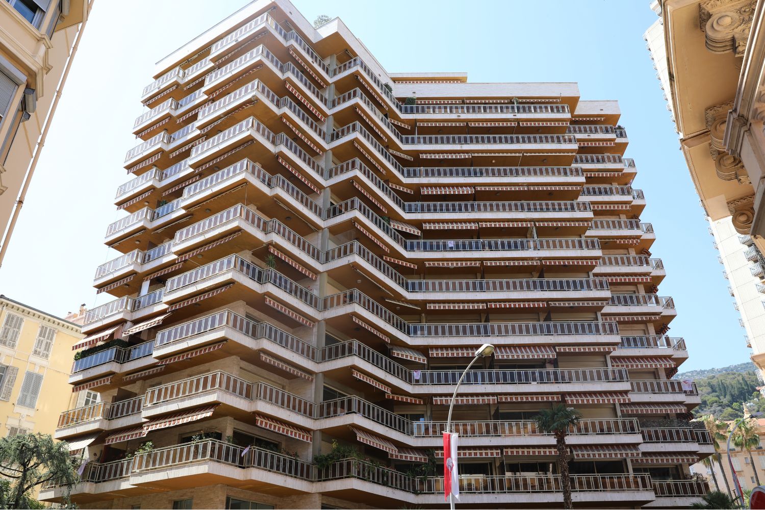 Exterior view of Buckingham Palace, Monte-Carlo, with luxury balconies and panoramic views.