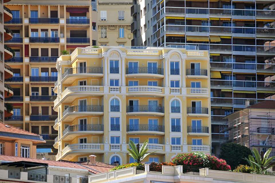 Exterior view of L’Oiseau Bleu luxury residence in Monaco’s Jardin Exotique neighborhood.