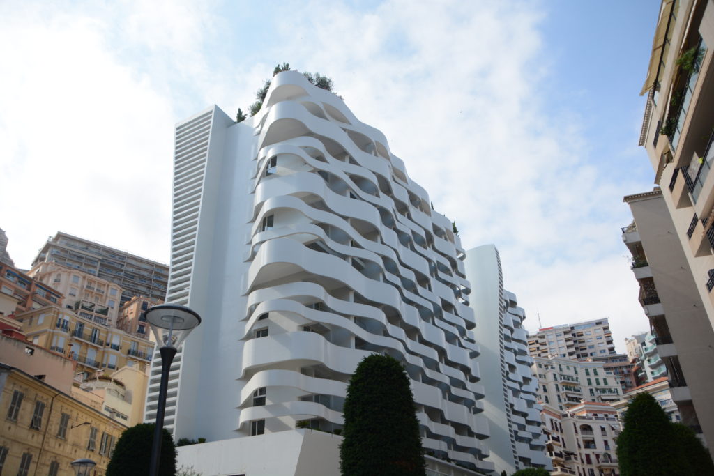 View of the modern Le Stella building, Monaco, with stylish apartments and sleek architectural design.