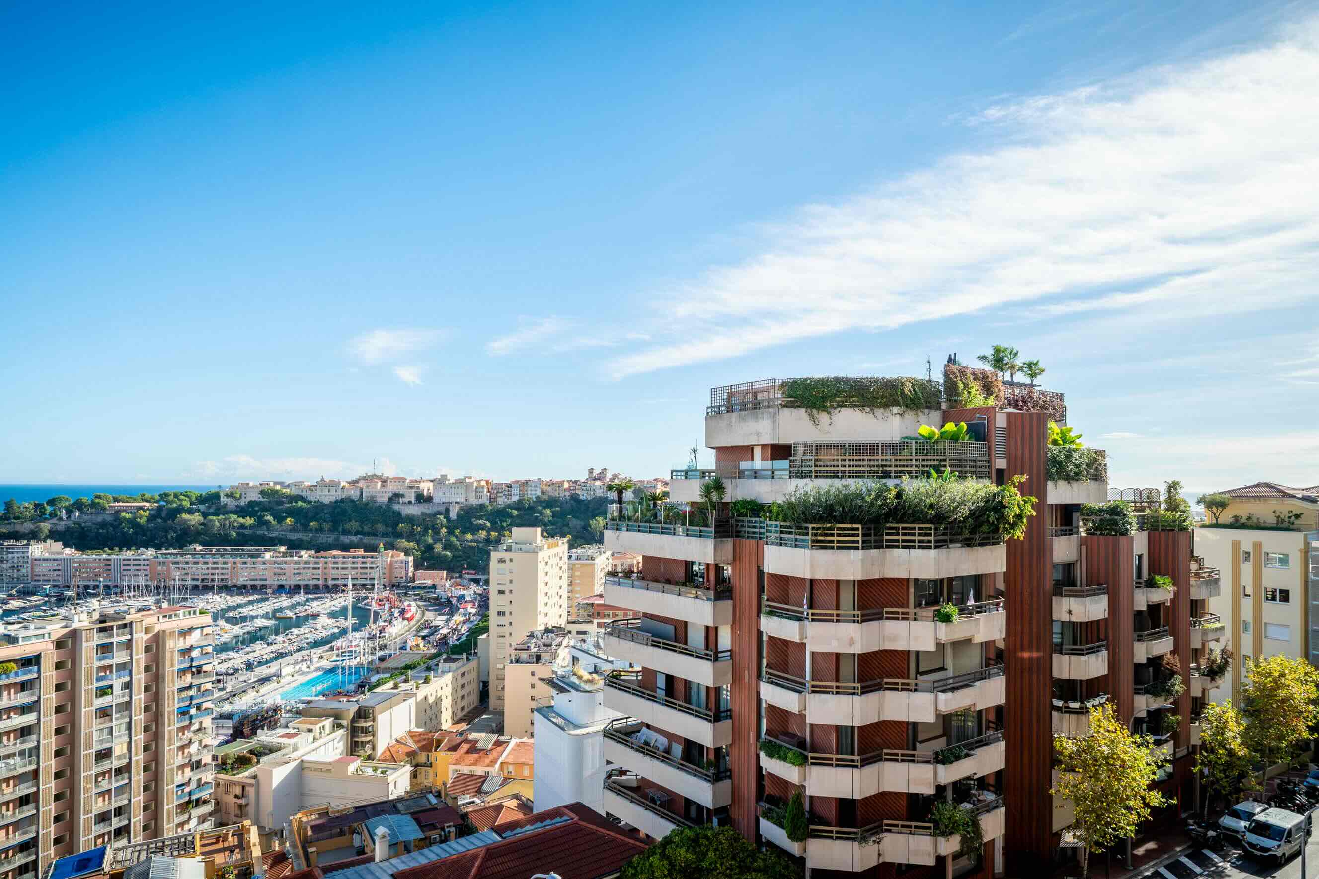 View of Beverly Palace in Monaco’s Moneghetti district, showcasing its elegant architecture, panoramic views of the Mediterranean Sea, and spacious balconies in a peaceful, upscale location.