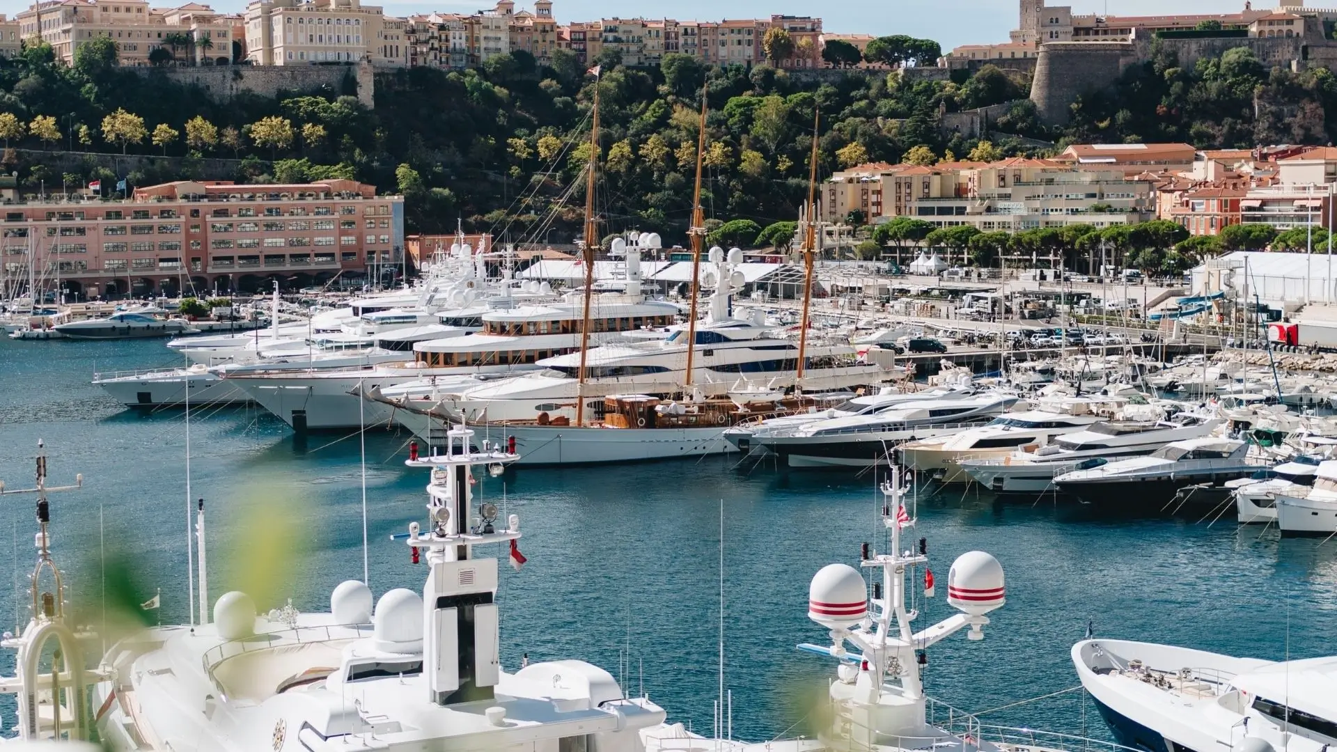 Viewing of the port Hercule with the boats and in the background we see the Condamine and Monaco-ville district.