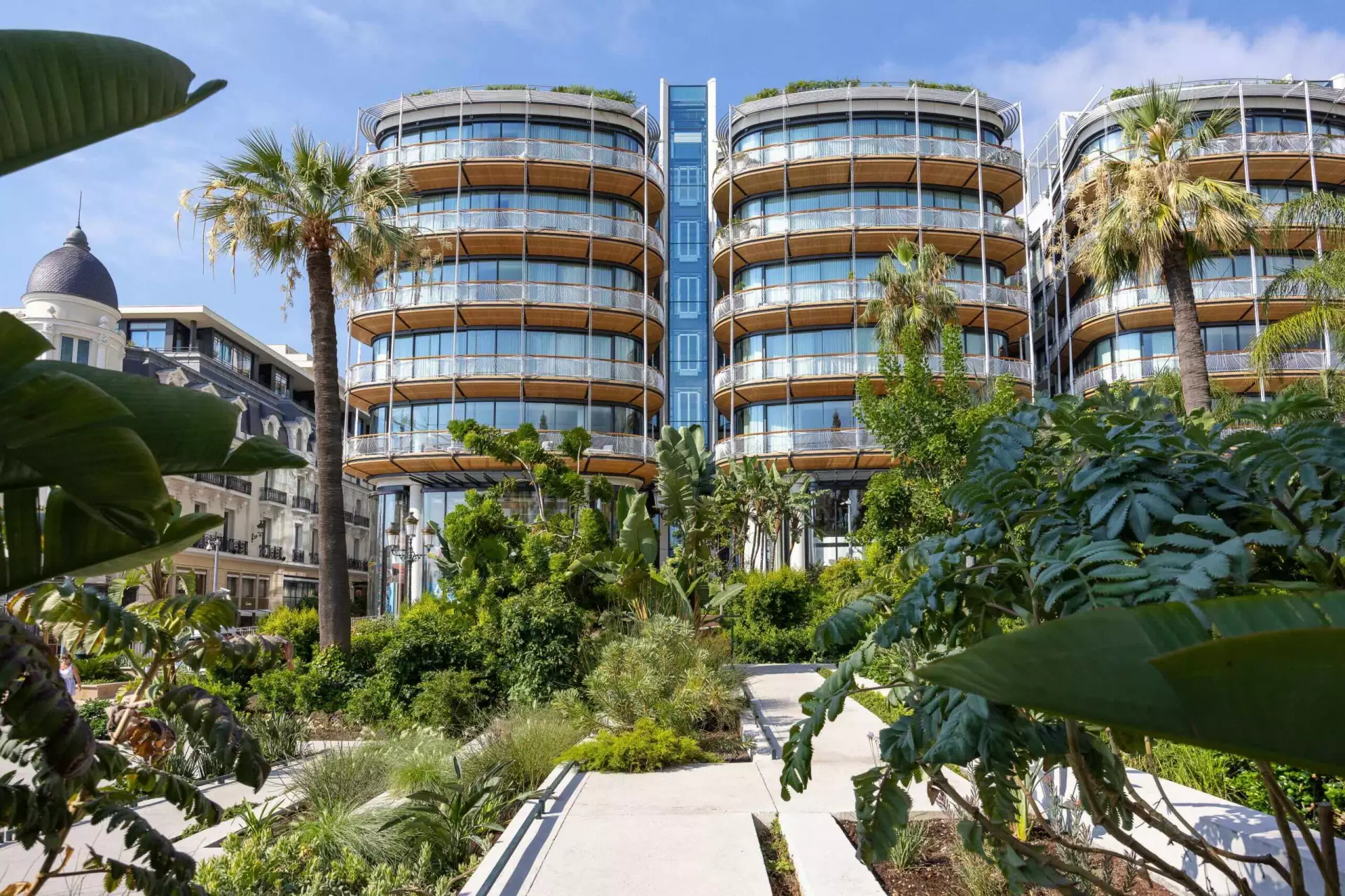 Modern luxury residences and landscaped gardens in Monaco’s Carré d’Or district.