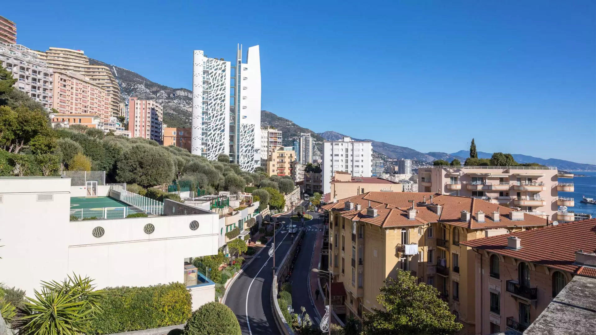 View of residential towers and greenery in the Jardin Exotique district of Monaco.