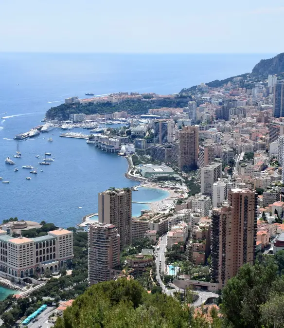 A view over Monaco's skyline showing the Principality's luxury real estate and the Mediterranean Sea