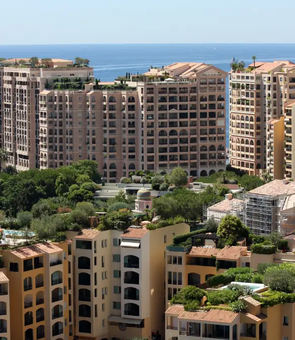 Luxury residential buildings in Fontvieille, Monaco with the Mediterranean sea in the background