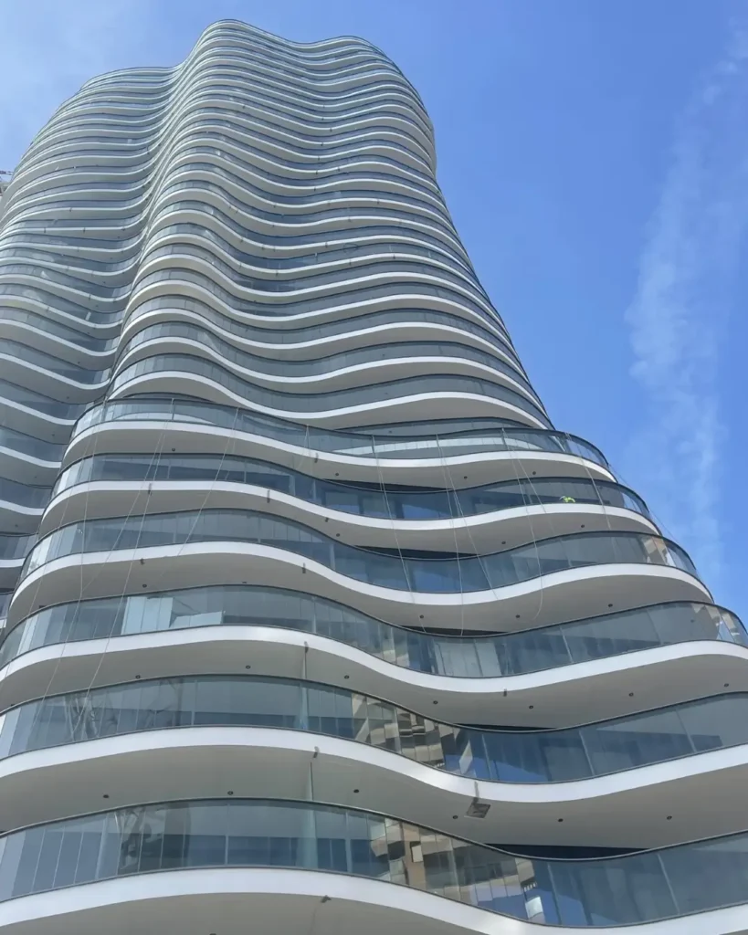 The exterior facade of Testimonio II, a luxury modern building in Monaco